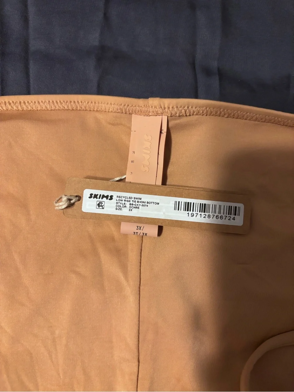SKIMS SWIM RUCHED T-SHIRT and LOW RISE TIE BIKINI BOTTOM in Ochre